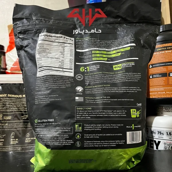 عکس جدول Supplement Facts و ترکیبات مکمل Rule 1 Mass Gainer روی پشت بسته‌بندی